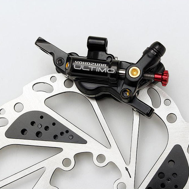Ultimo, Cable-actuated Hydraulic Disc Brake, Post mount.